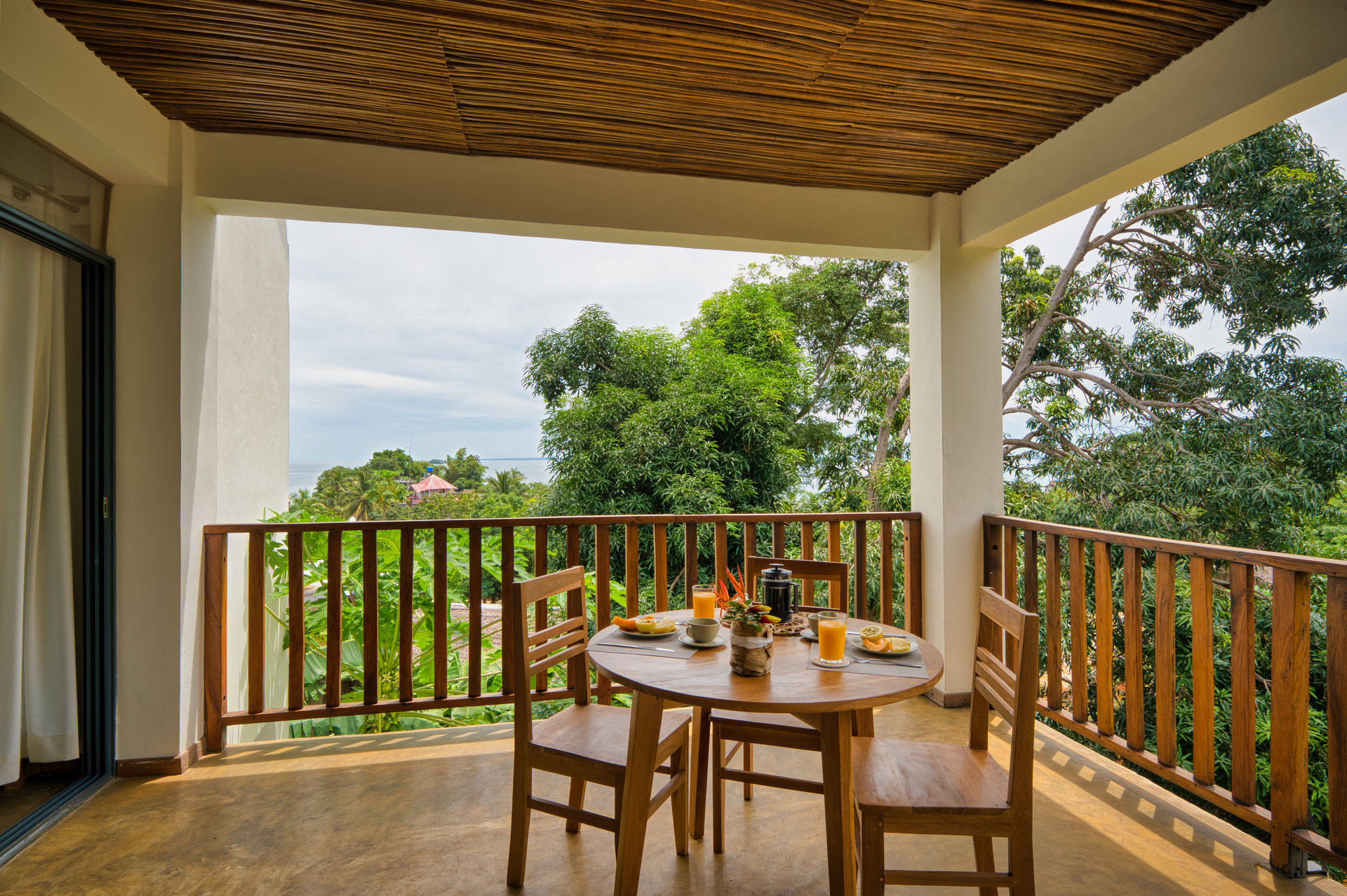 Family Studio private balcony with dining and jungle view