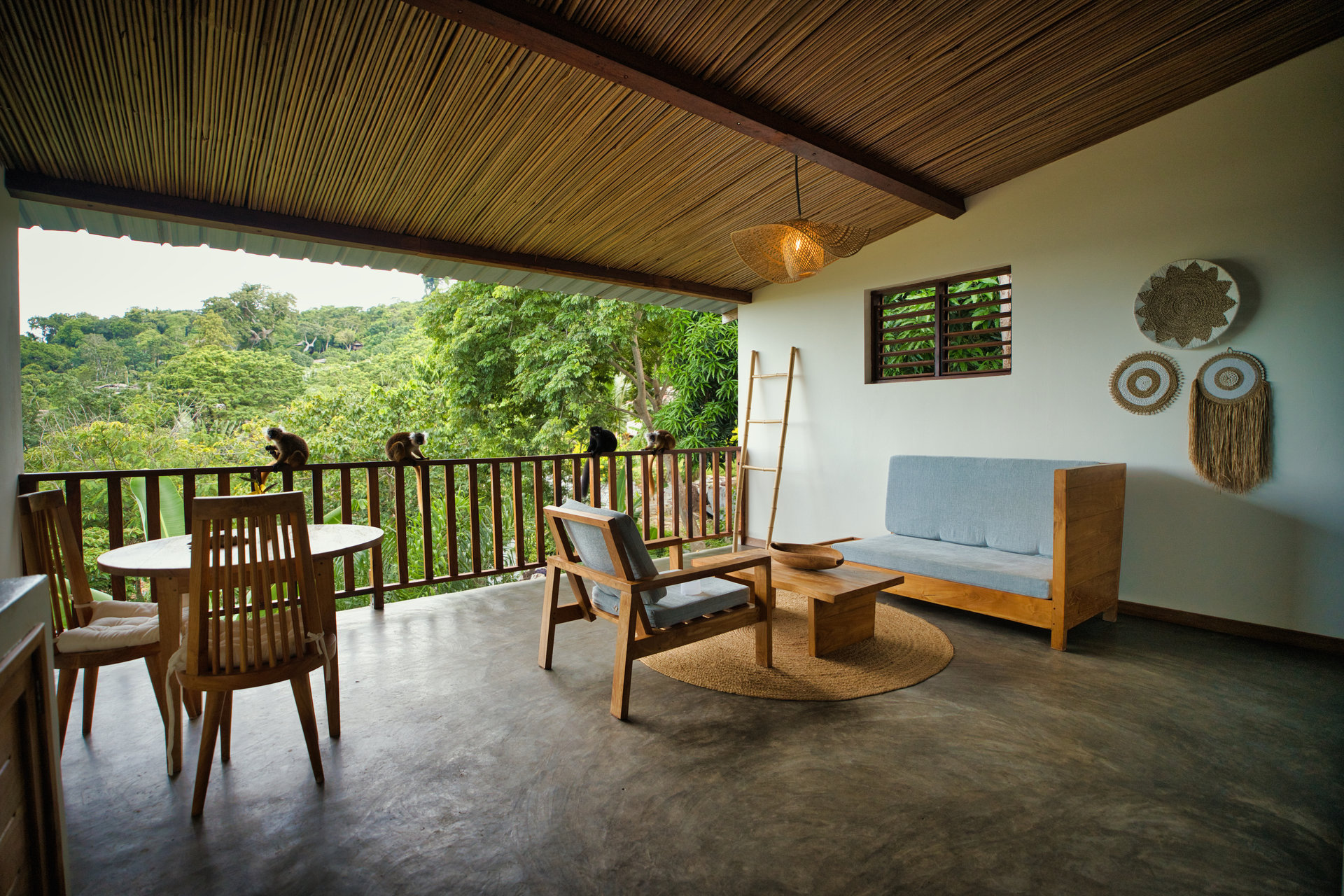 Studio with Ocean View open terrace with lemurs on the balcony railing and jungle view